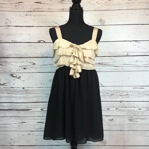 Flirty off white and black dress by Miss Chievous